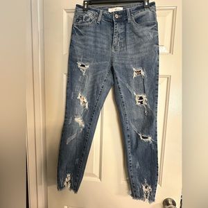 Kancan jeans size 7/27 $35 each plus shipping.  Black and button never worn.